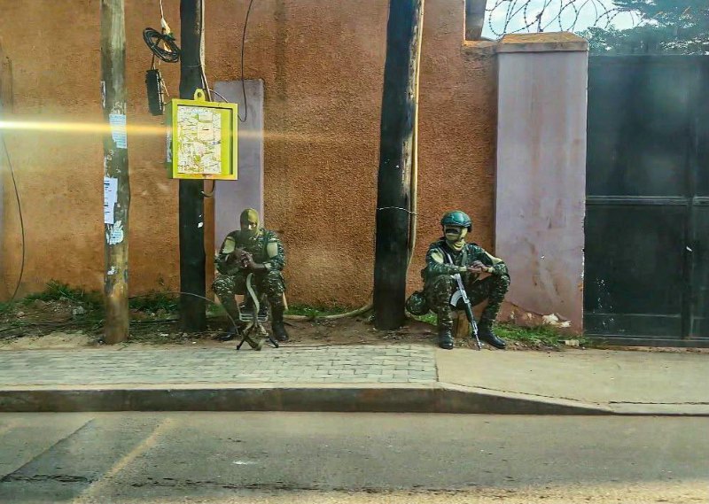 Armed soldiers are on guard outside the headquarters of Daily Monitor newspaper in Namuwongo, Kampala. NTV Uganda