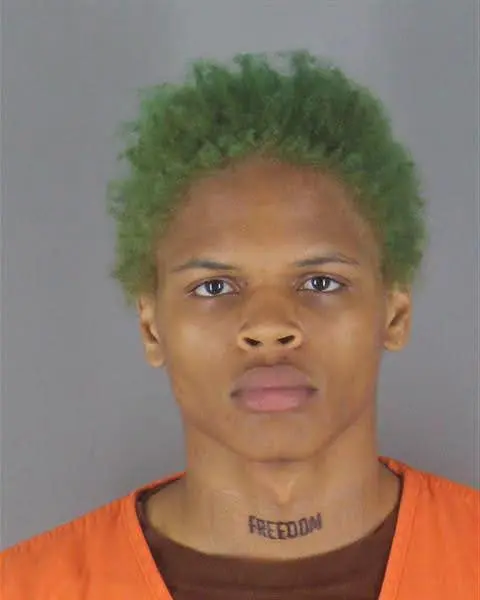 Abba Marcus Mayanjas mugshots after arrest