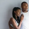 A man and woman embrace each other